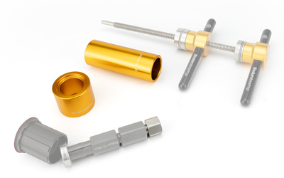 Enduro BRT-041 Blind Bearing Extraction Toolkit shown with the loose freehub bearing and the BRT-060 and 15mm Blind Puller tools